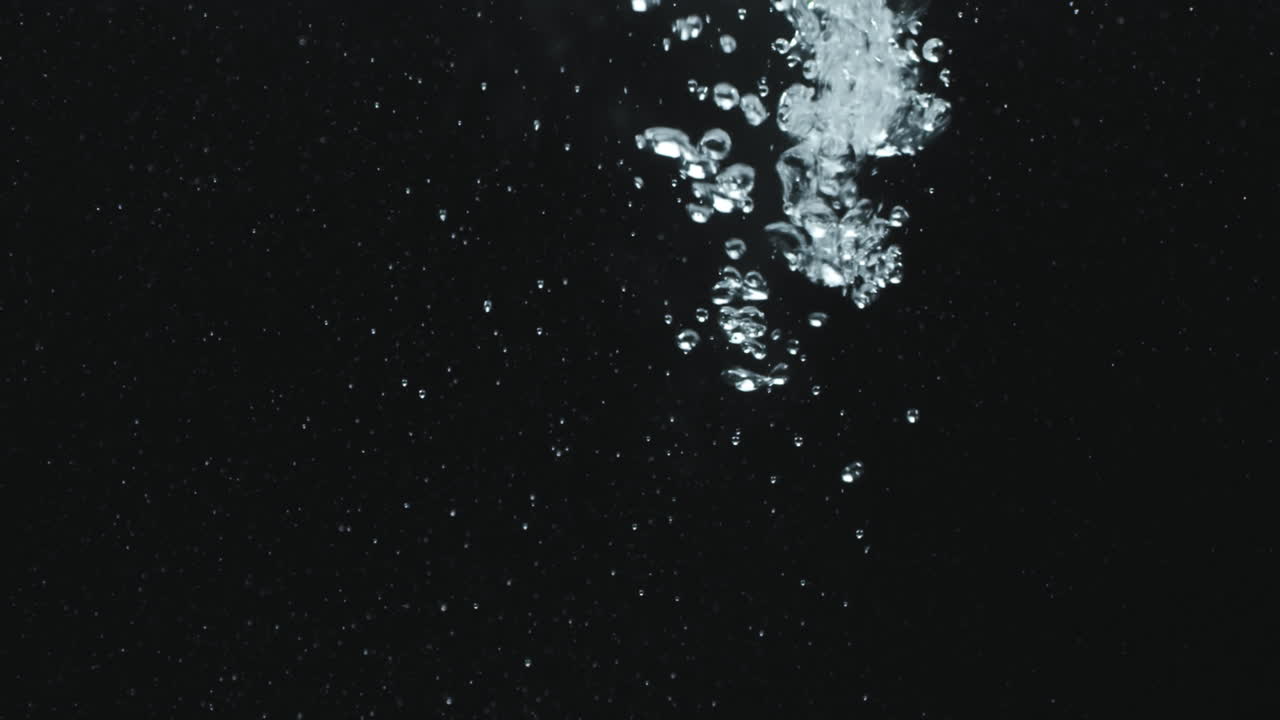 Bubbles in Water on Black Background