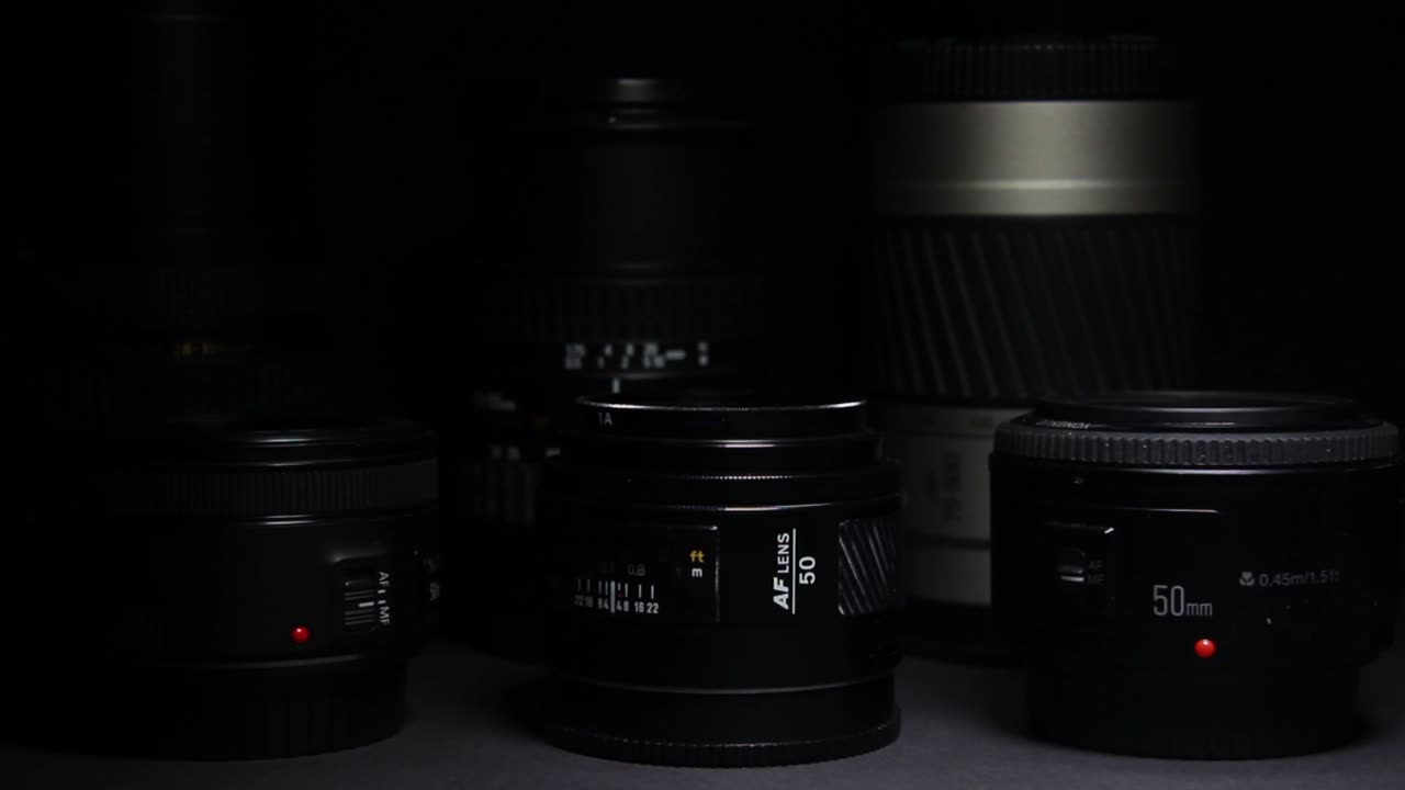Camera Lenses Without Visible Brands on Black Background