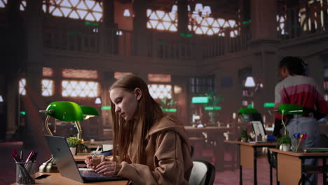 vertical video female student reading and writing detailed notes for an exam