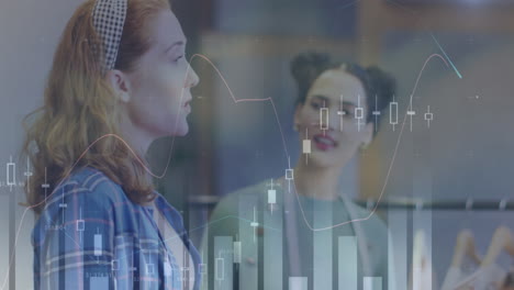 animation of data processing over two diverse female fashion designers discussing at studio