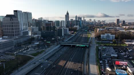 aerial view of moving traffic on the metropolitan highway, downtown atlanta famous skyscrapers, skyline buildings, georgia, usa