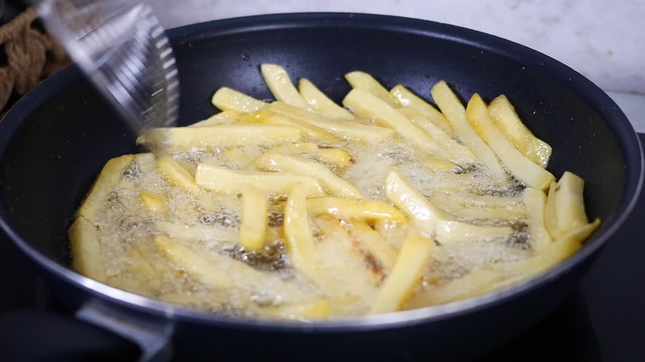 Frying French Fries in a Pan