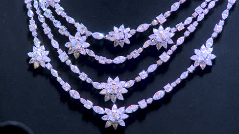 close up of a diamond necklace - out of focus to focus shot