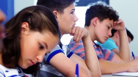 students studying in classroom