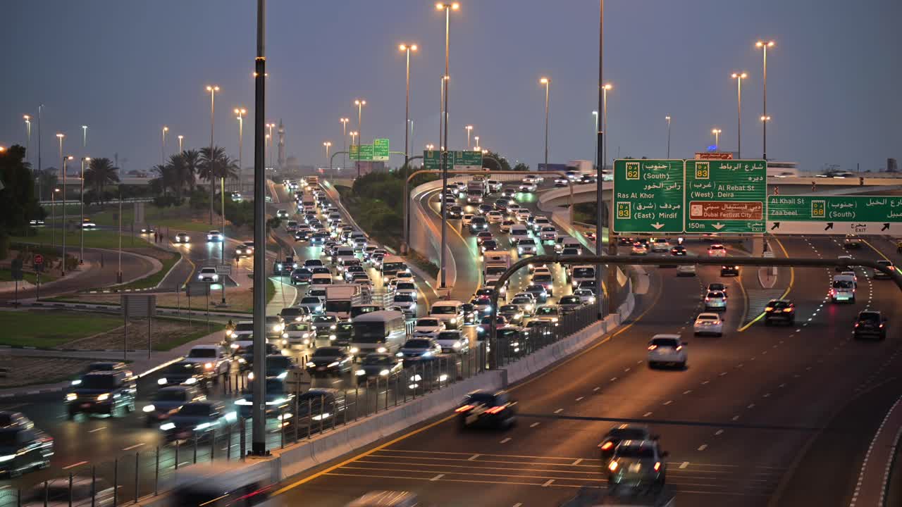 Timelapse of evening traffic on Nadd Al Hamar Road in Dubai, heading towards the airport tunnel, United Arab Emirates