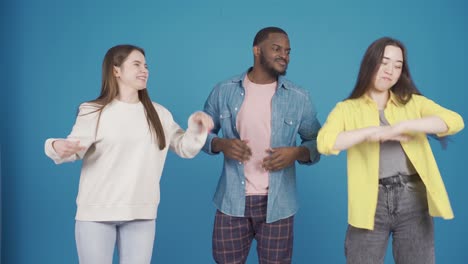 multiethnic young people dancing, having fun.