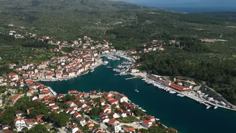 panorama of green mountains and milna village in brac island, croatia at daytime