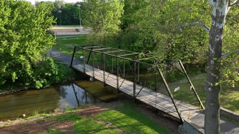 bridge over small river in summer