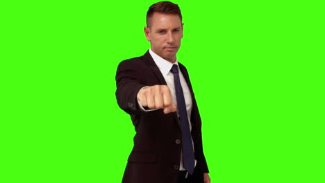 Businessman-standing-with-fist-out