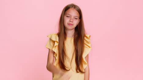 child girl kid coughing into elbow with tired expression showing sickness concern health awareness
