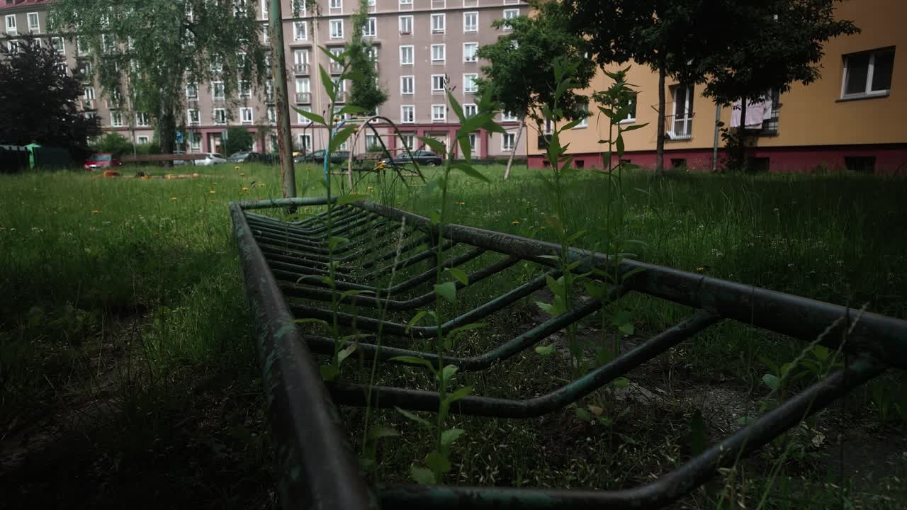 Nostalgic urban children's playground in Soviet era apartment area