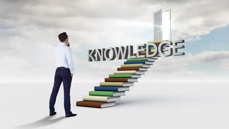 businessman looking at a word put on a stair made of books