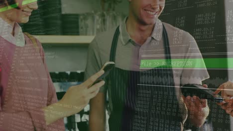 animation of lines and data processing over happy caucasian woman paying with smartphone at cafe