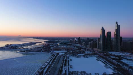 chicago loop and michigan lake at sunrise in winter. aerial view. chicago, usa