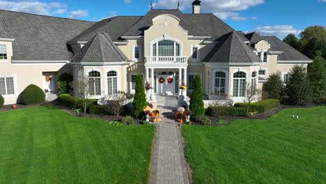 large american home decorated for halloween