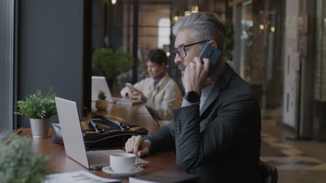 businessman working in a coffee shop