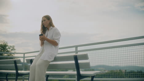 Sad-Pensive-Woman-Browsing-Smartphone