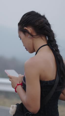 woman using smartphone