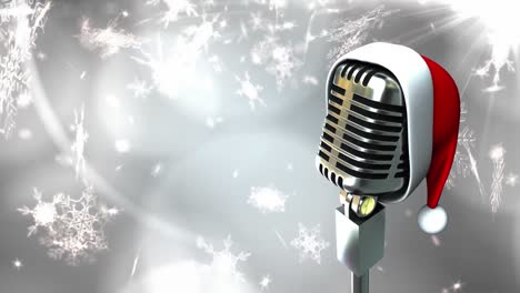 Digital-animation-of-santa-hat-on-microphone-against-snowflakes-moving-on-grey-background