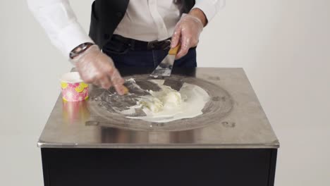 making homemade ice cream on a flat top grill