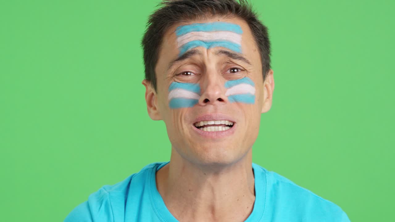 Very nervous man supporting argentine team during a difficult match