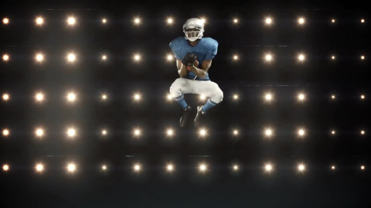 Giocatore di football americano contro luci lampeggianti