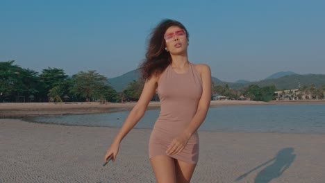 woman in a dress on the beach