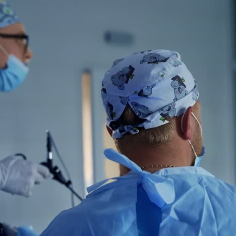 team surgeon at work in operating room