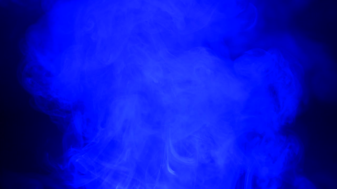 Ambient, abstract, sci fi, ethereal blue smoke and light motion background for mystical, dreamlike, background atmosphere with calm, serene slow motion fog and moving smoke and light.