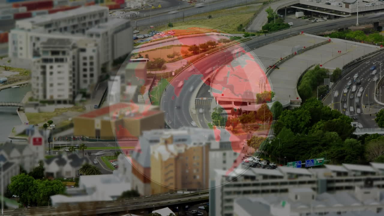 Cityscape with roads and buildings overlaid by digital globe animation