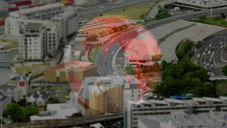 cityscape with roads and buildings overlaid by digital globe animation