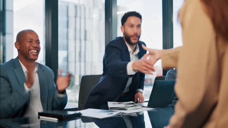 business meeting and handshake agreement