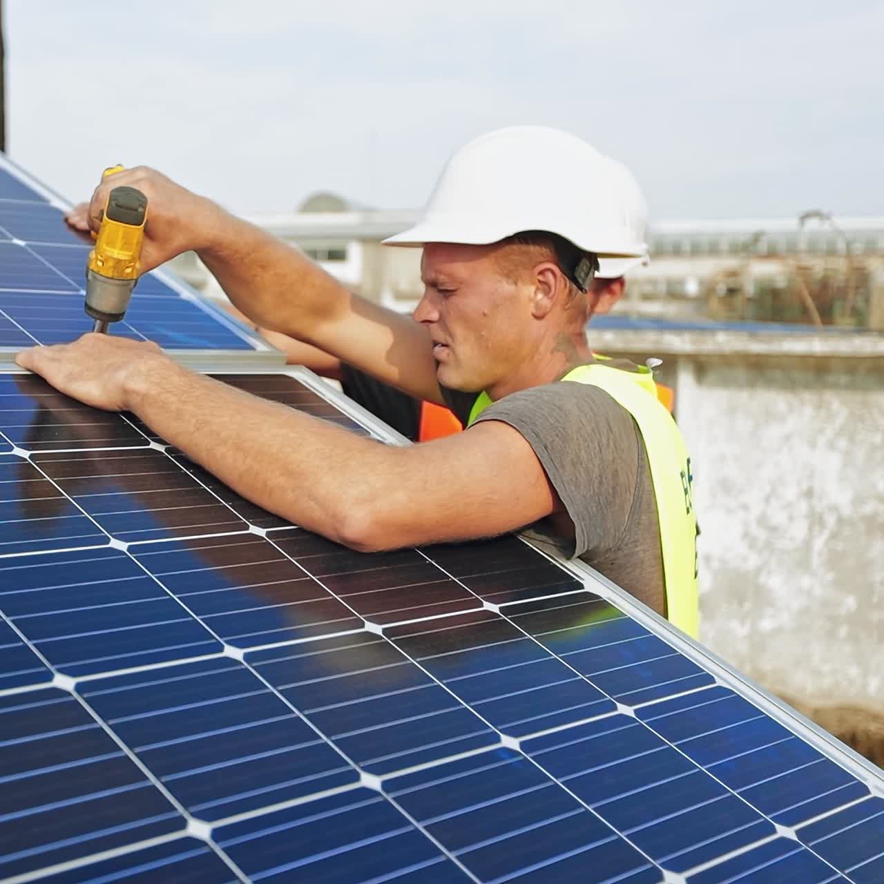 Technician installing solar cell