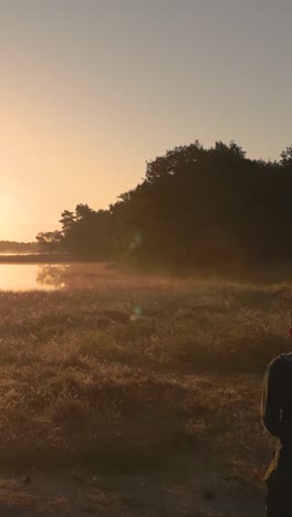 misty sunrise over a lake