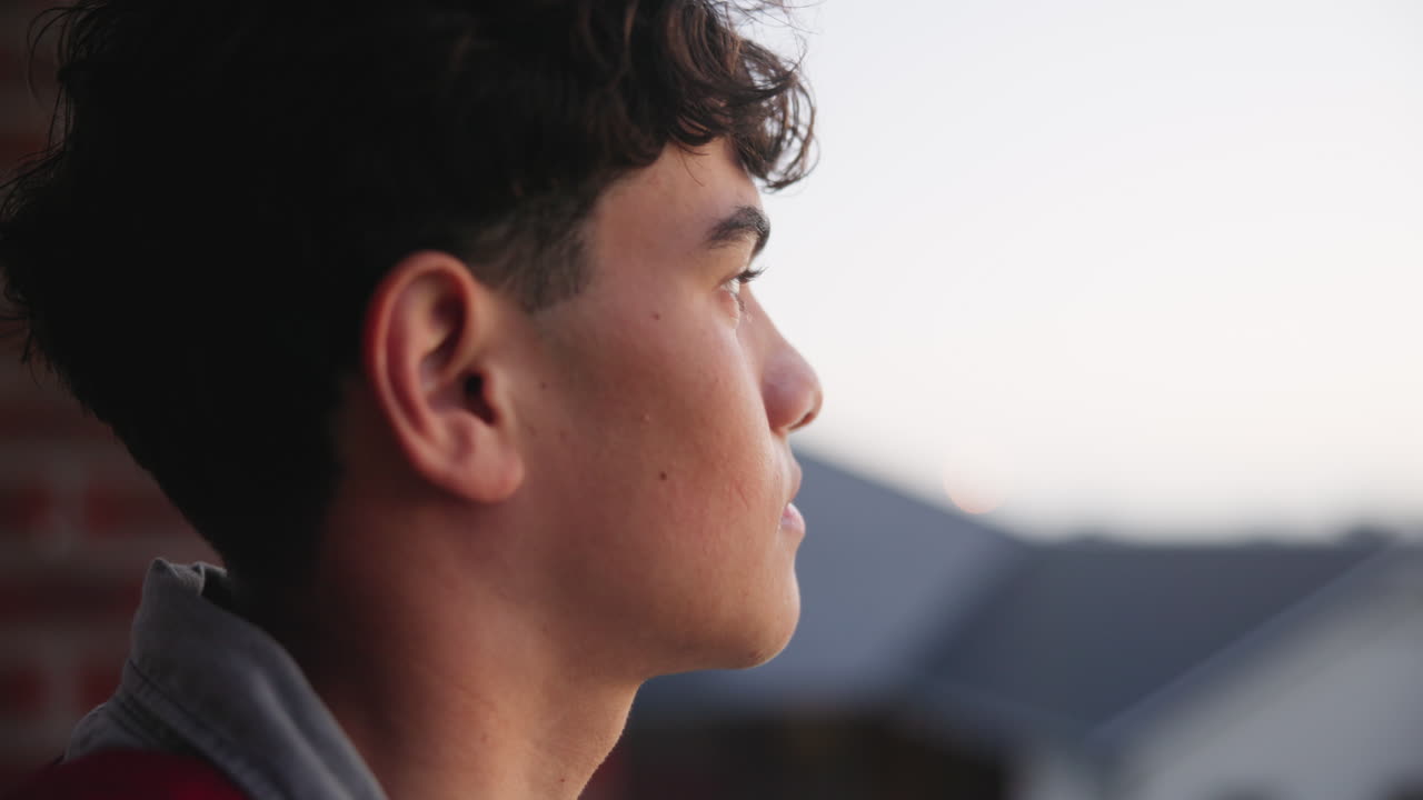 Portrait of a thoughtful teenager looking off into the distance