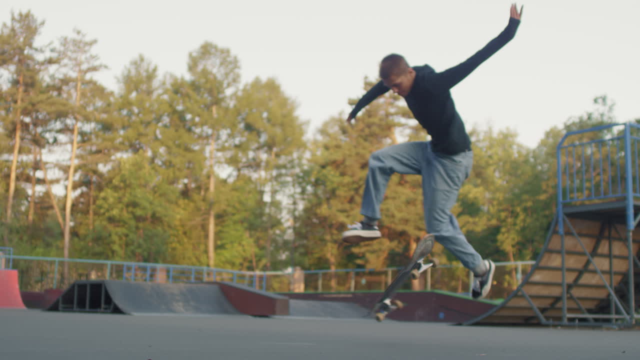 Teenager Doing Kickflip on Skateboard