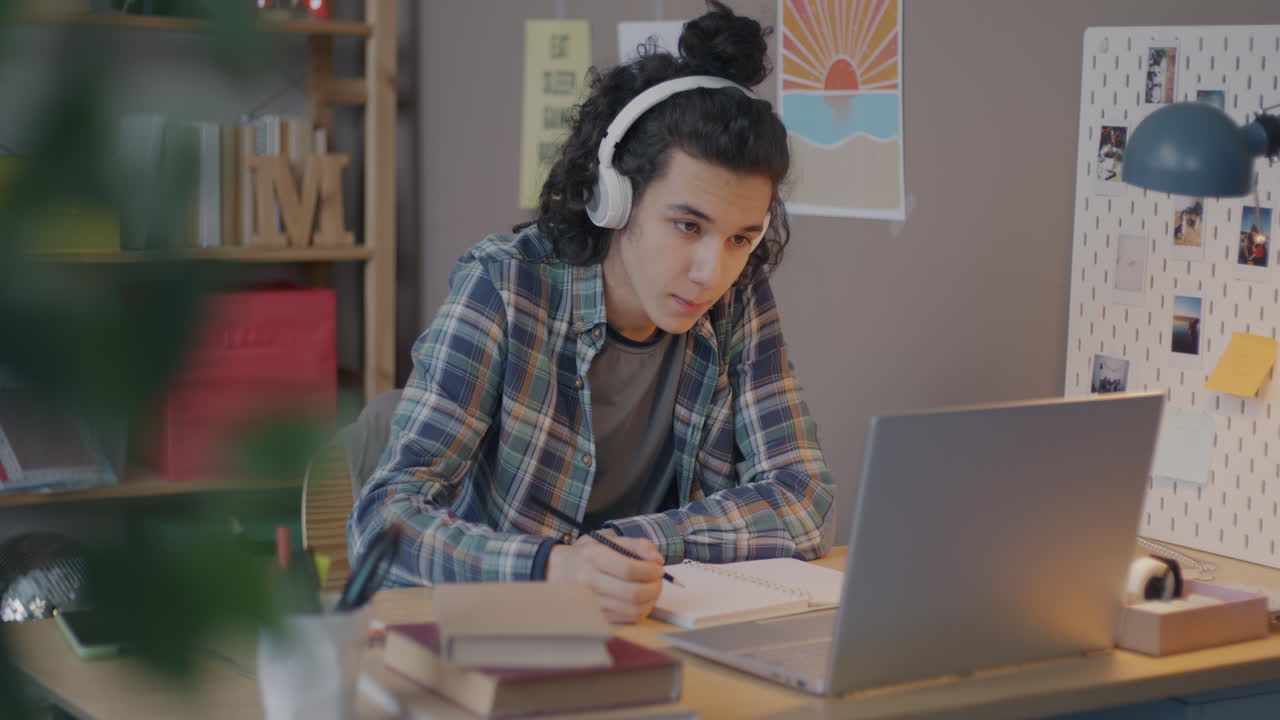 Teenager Studying Online