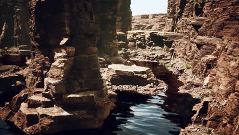 stunning red rock canyon with water reflection