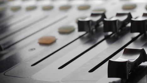 Digital-audio-console.-Motorized-sliders.-Close-up