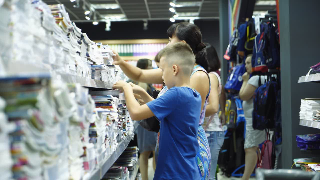 Vinnitsa, Ukraine - August, 2018: Back to school concept. Purchase of stationery in the store