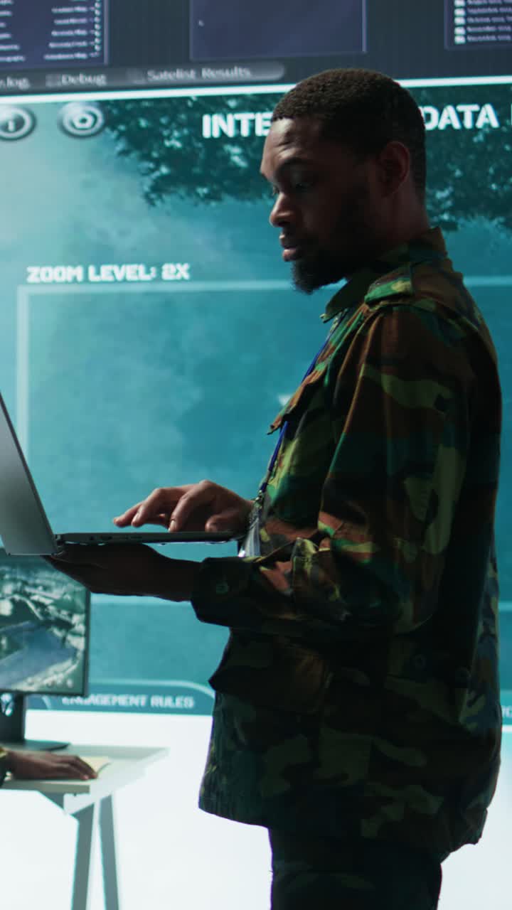 Vertical Video Military officers work in a high tech army control tower base