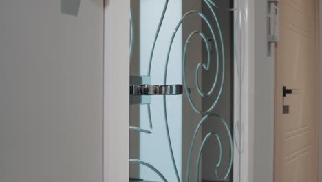 glass door with spiral design