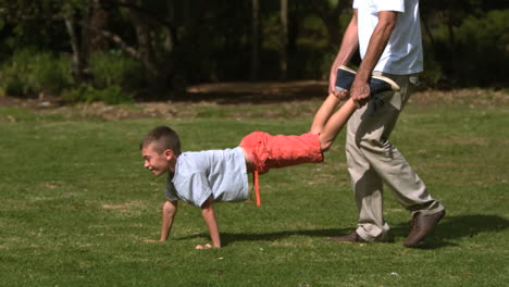 father playing with his son