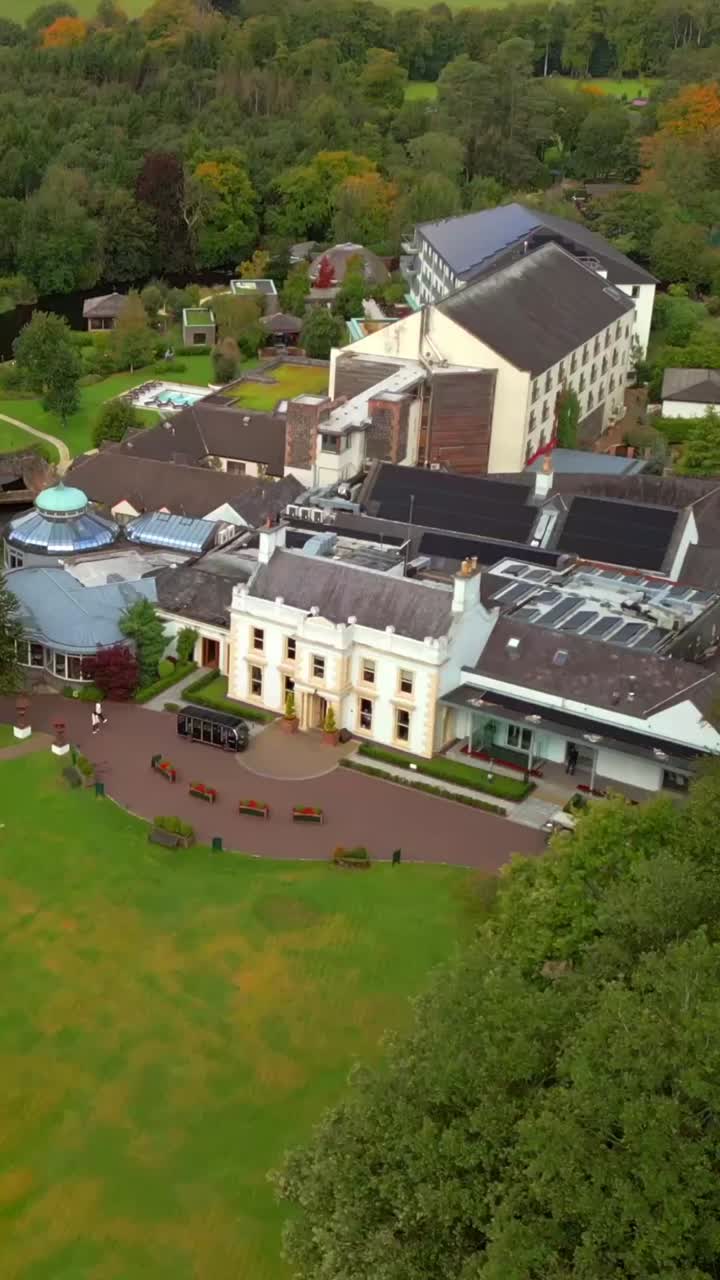 Overhead social ratio 60FPS aerial of Galgorm Estate in Ballymena, County Antrim in Northern Ireland. Produced in 1080x1920 with broadcast ready Rec709 color