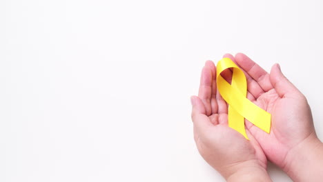 Suicide-prevention-day,-Childhood,-Sarcoma,-bone,-and-bladder-cancer-Awareness-month-and-Yellow-Ribbon-for-supporting-people's-life-and-illness