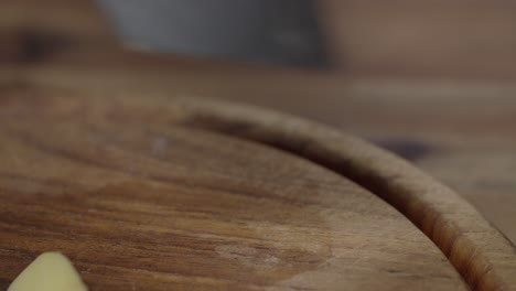 close-up of a chef cutting raw potatoes into stripes