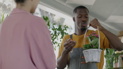 customer looking at plants in a flower shop