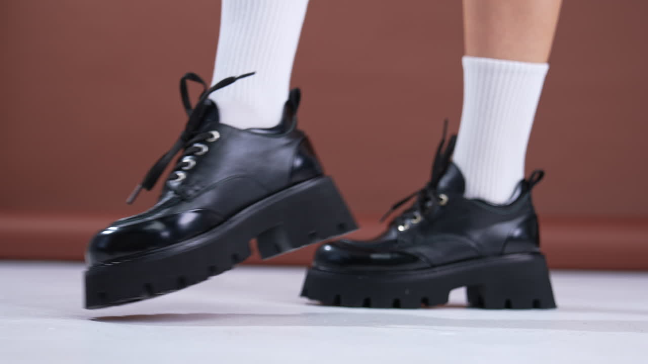 Stylish Platform Ankle Boots on a Woman's Feet