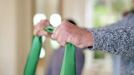 Hands,-senior-man-and-resistance-band