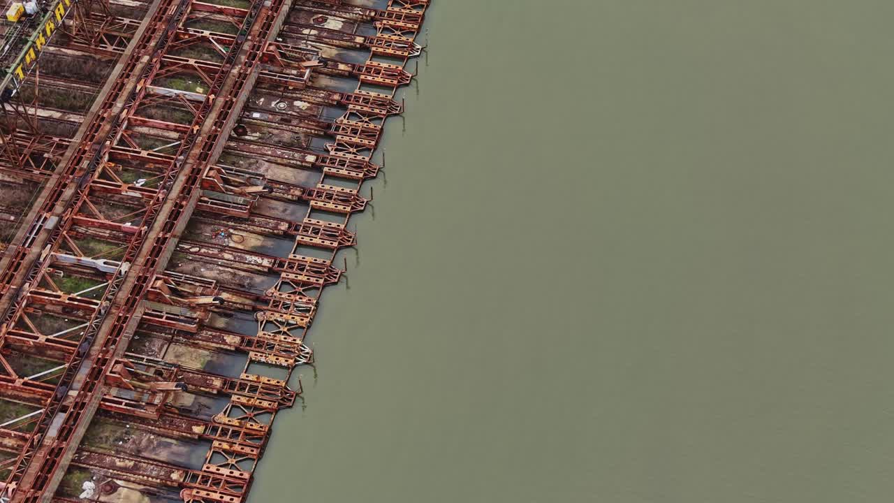 Shipyard with multiple vessels in dry dock for maintenance work